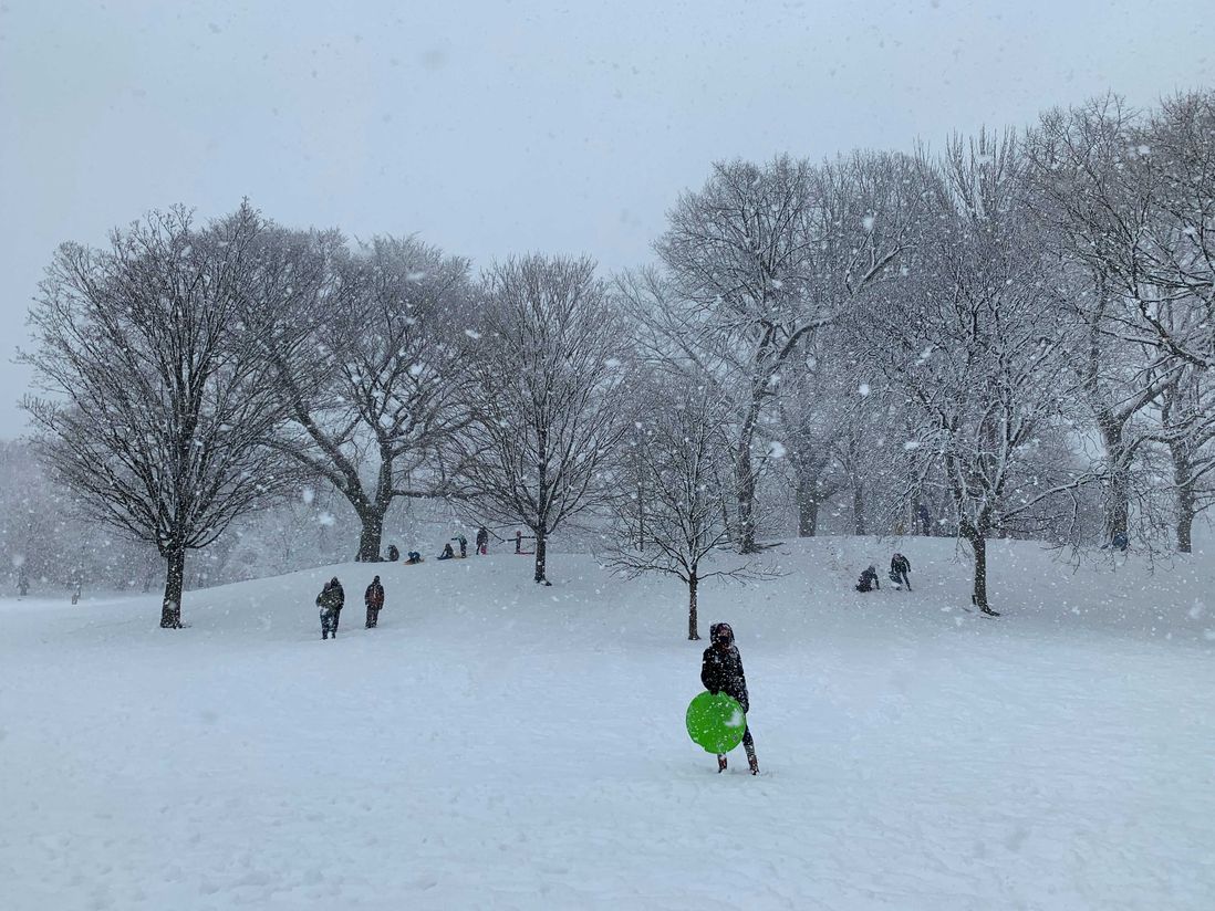 Children sled in Prospect Park on Sunday, February 7, 2021.